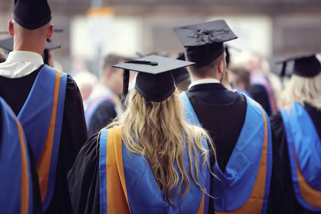 An image of University graduates at a graduation ceremony.