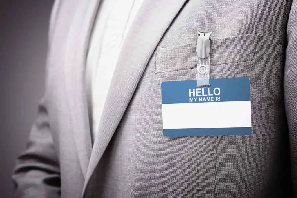 An image of a Businessman wearing Hello my name is tag.