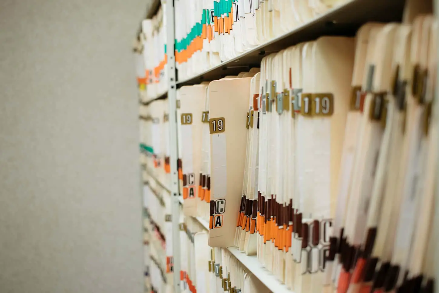 An image of Charts at a medical office, record, archive.